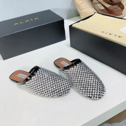 Alaïa Flat Mules in Strass Lambskin – Elegant Sparkle in Luxurious Leather in Dubai UAE