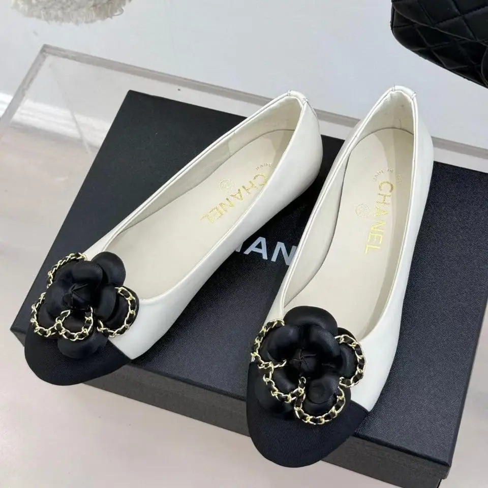 Chanel Ballet Flats – White Leather with Black Cap Toe & Gold Chain Flower Detail in Dubai UAE Chanel Ballet Flats – White Leather with Black Cap Toe & Gold Chain Flower Detail in Dubai UAE