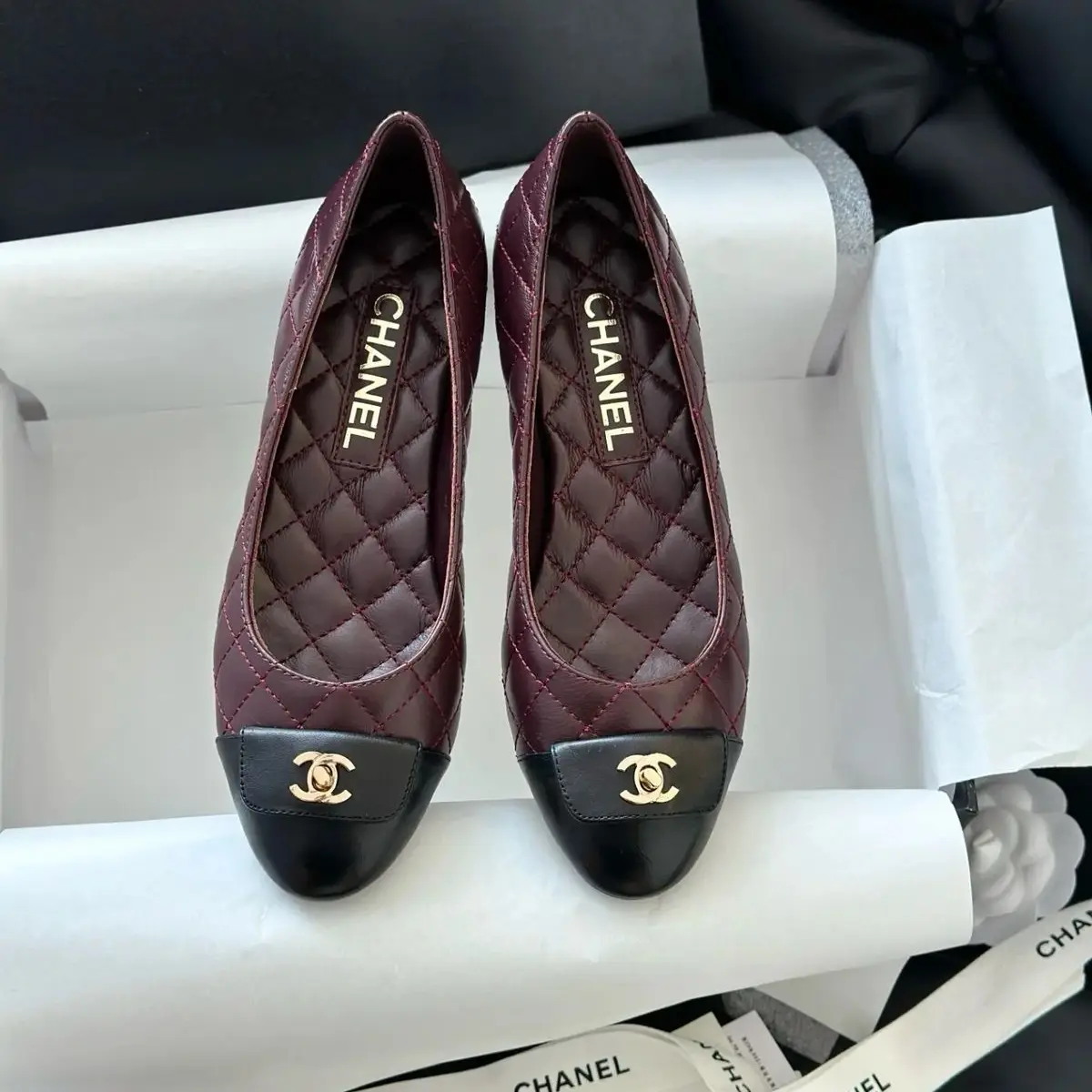 Chanel Women's Burgundy Quilted Ballet Flats with Black Cap Toe & Gold CC Logo in Dubai UAE