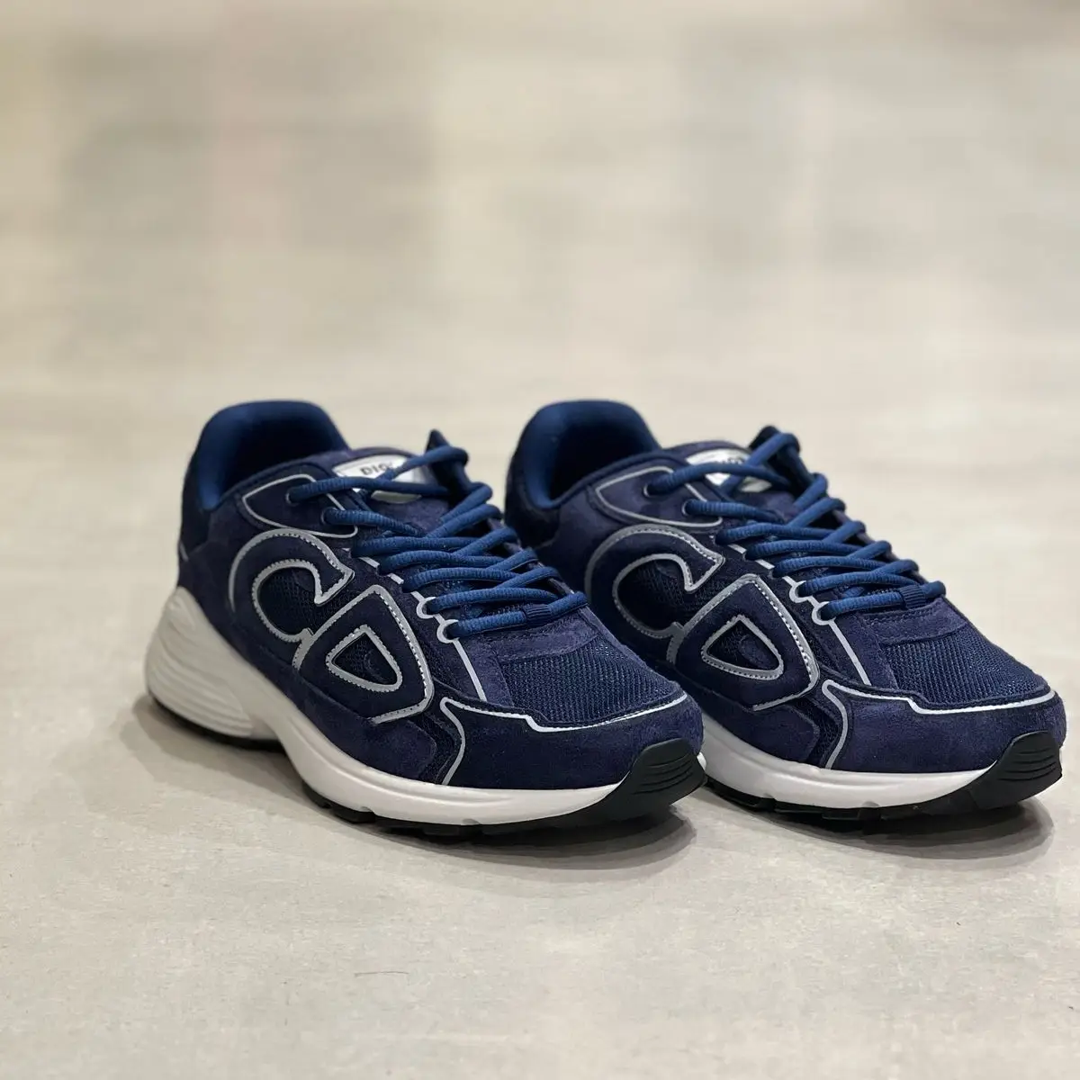 Dior B30 Sneakers Deep Blue – Mesh & Technical Fabric with Reflective “CD” Logo in Dubai UAE Dior B30 Sneakers Deep Blue – Mesh & Technical Fabric with Reflective “CD” Logo in Dubai UAE