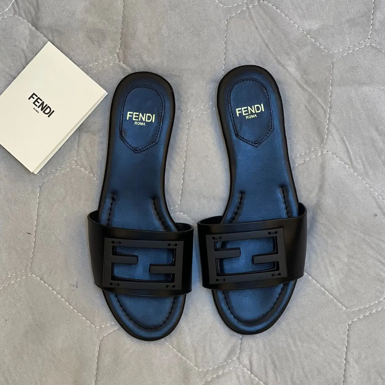 Fendi Black Leather Slides – Elegant Sandals with Iconic Logo Strap in Dubai UAE Fendi Black Leather Slides – Elegant Sandals with Iconic Logo Strap in Dubai UAE