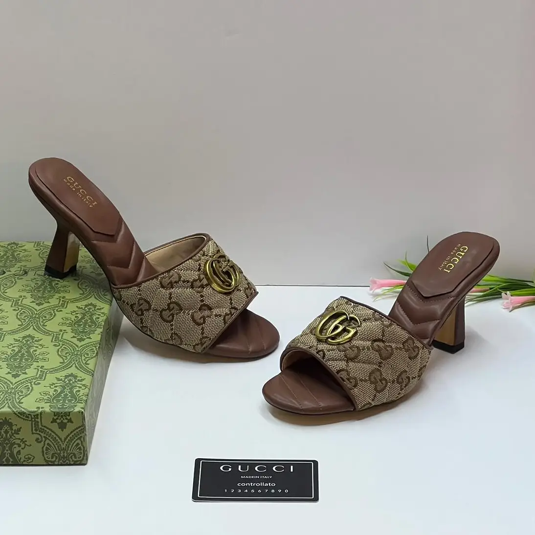 Gucci Women’s Slides – Quilted Strap Sandals with GG Logo & Brown Leather Sole in Dubai UAE Gucci Women’s Slides – Quilted Strap Sandals with GG Logo & Brown Leather Sole in Dubai UAE