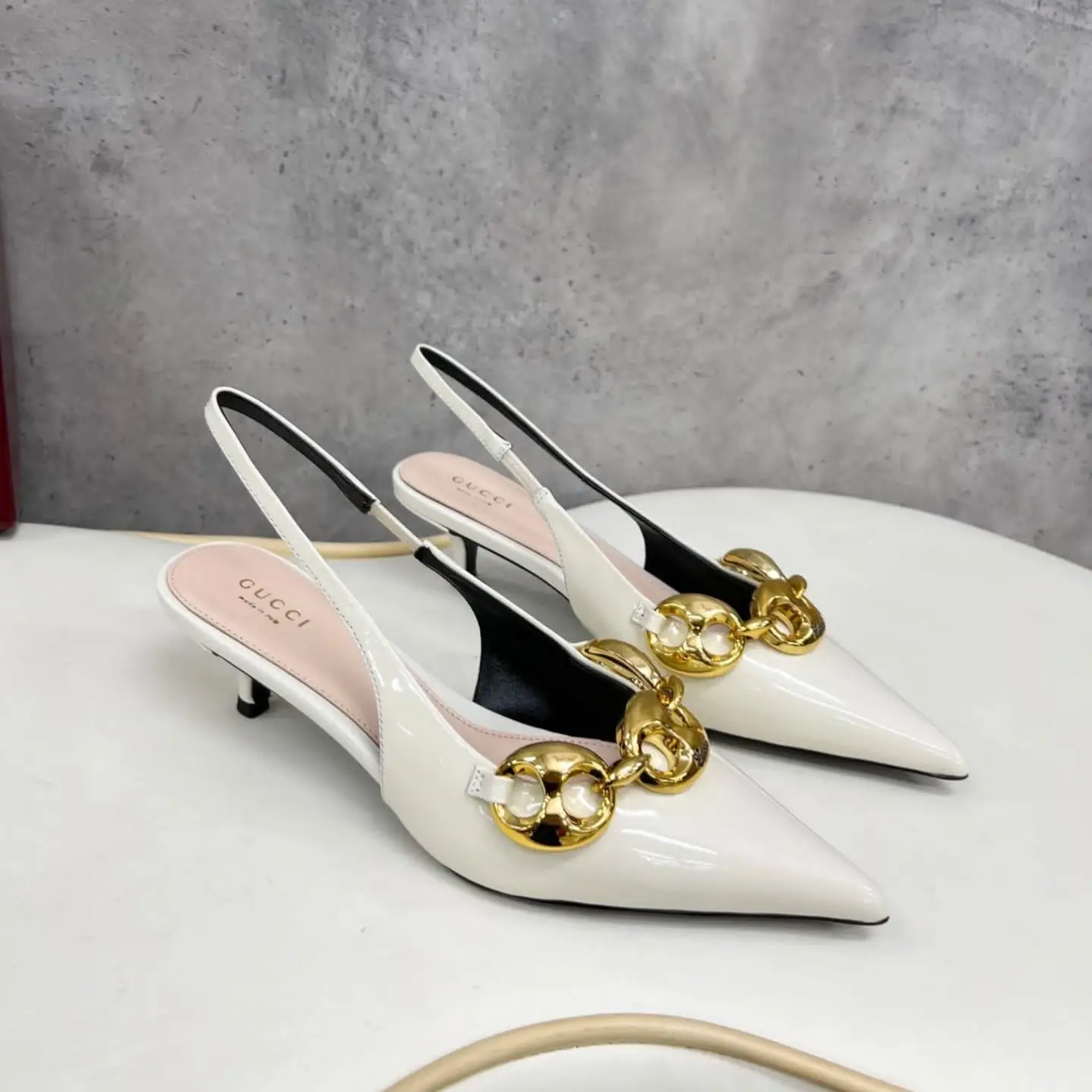 Gucci Women’s Square Toe Patent Leather Pumps – Dark Red with Gold Chain Detail in Dubai UAE Gucci Women’s Square Toe Patent Leather Pumps – Dark Red with Gold Chain Detail in Dubai UAE