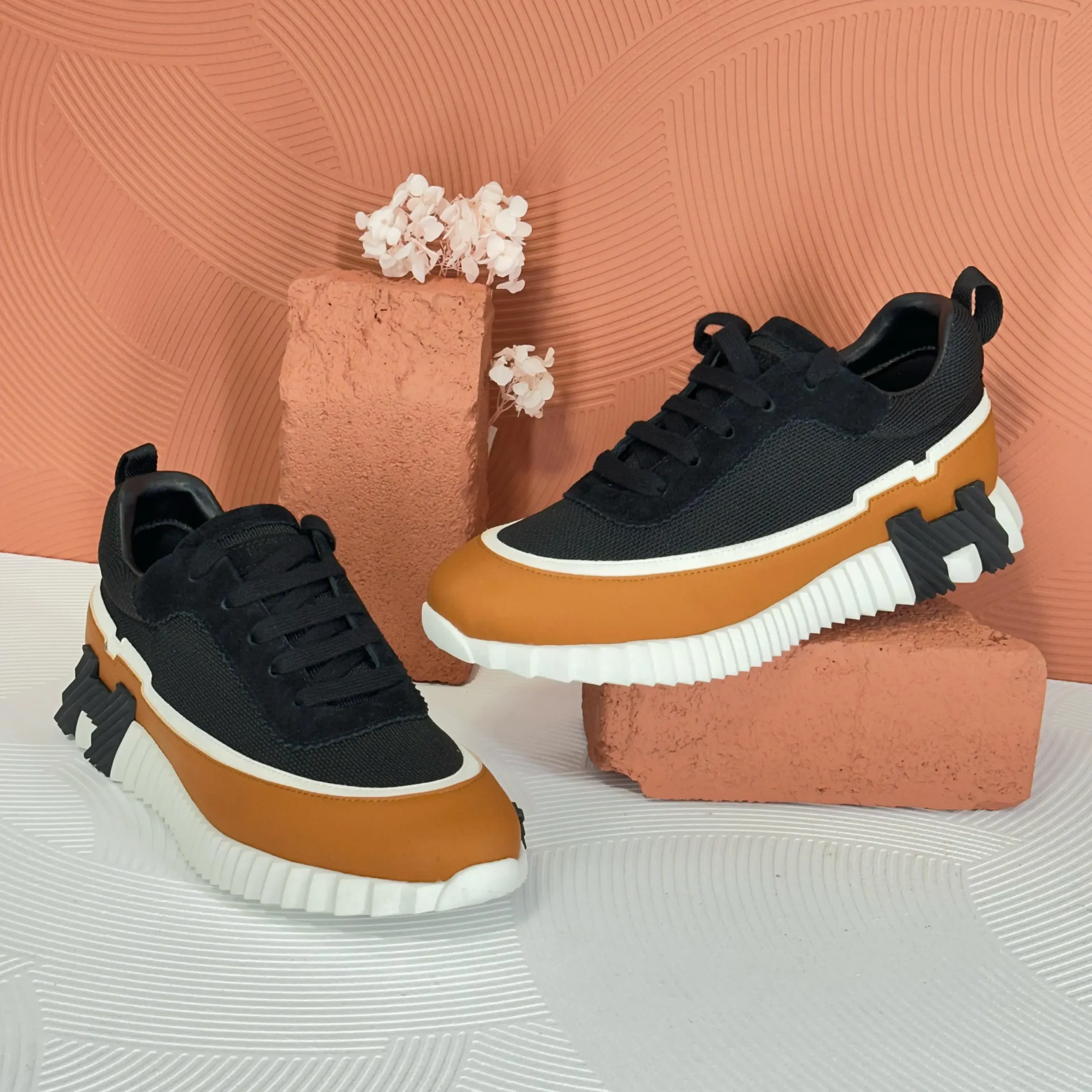 Hermès Bouncing Sneakers – Black Upper with Brown Midsole & White Ridged Outsole in Dubai UAE