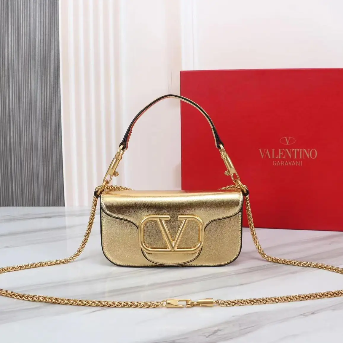 Valentino Garavani Locò Metallic Shoulder Bag in Dubai UAE Valentino Garavani Locò Metallic Shoulder Bag in Dubai UAE