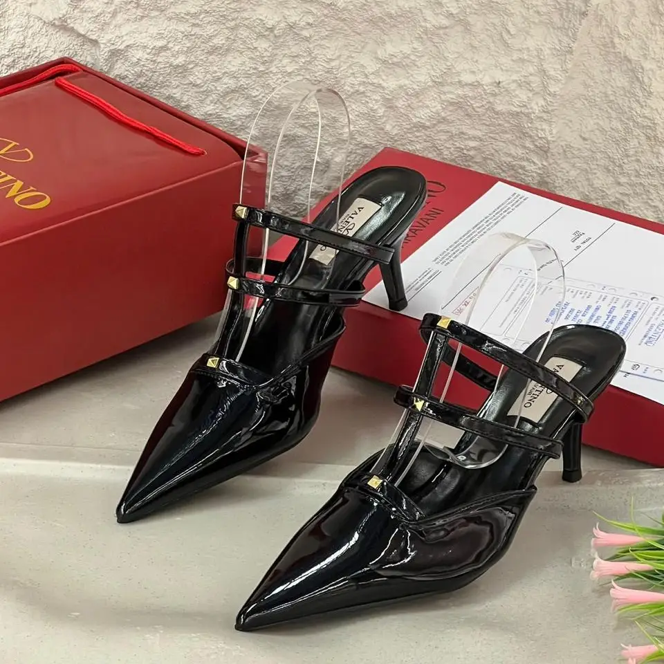 Valentino Garavani Rockstud Slingback Pumps – Black Patent Leather Pointed Toe Heels in Dubai UAE