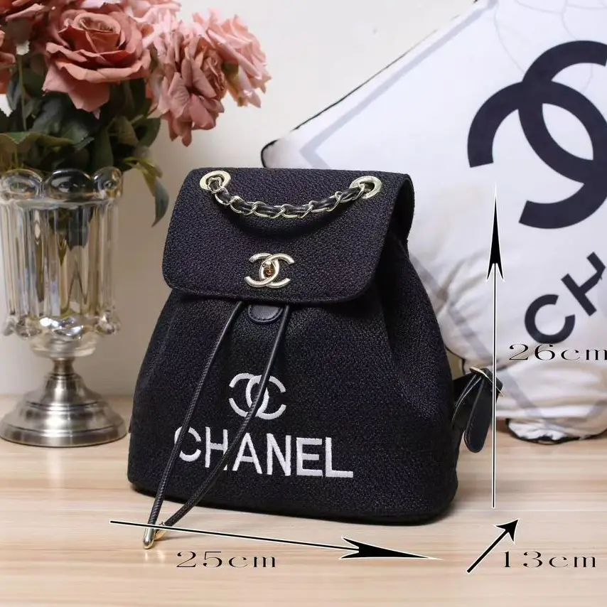 Chanel 25 Backpack – Spring-Summer 2025 Collection Black with Silver Chain & White Logo in Dubai UAE Chanel 25 Backpack – Spring-Summer 2025 Collection Black with Silver Chain & White Logo in Dubai UAE