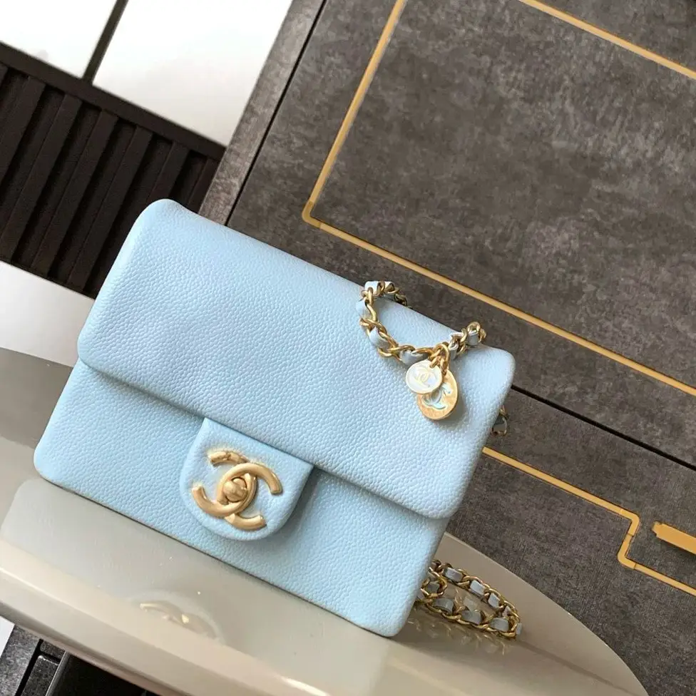 Chanel Mini Flap Bag in Light Blue – Iconic CC Logo with Chain Strap and Charm in Dubai UAE Chanel Mini Flap Bag in Light Blue – Iconic CC Logo with Chain Strap and Charm in Dubai UAE