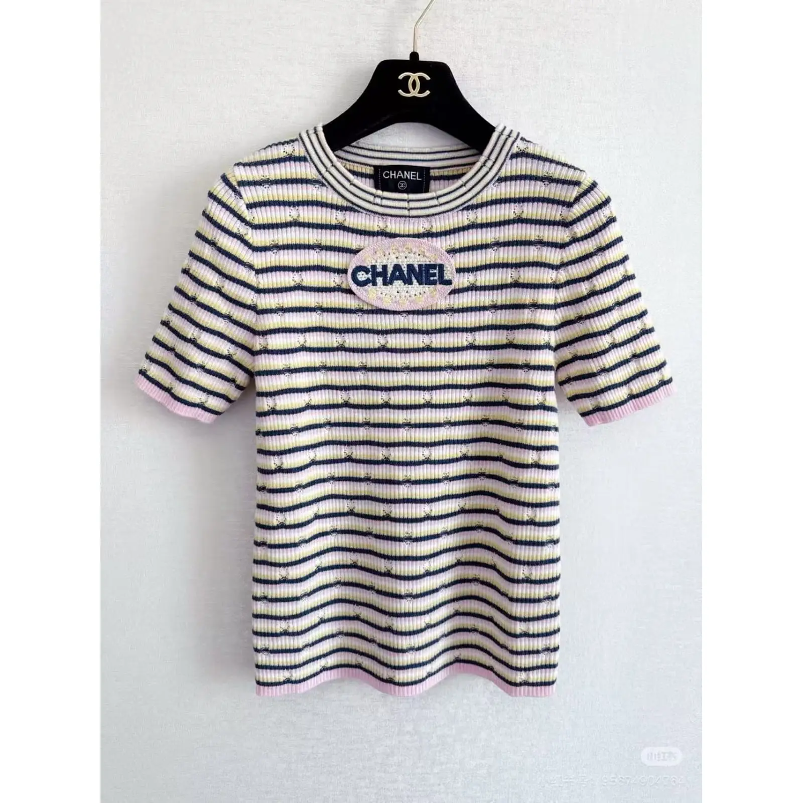 Chanel Striped Short-Sleeved T-Shirt – Cotton Top with Logo Oval Patch in Dubai UAE Chanel Striped Short-Sleeved T-Shirt – Cotton Top with Logo Oval Patch in Dubai UAE