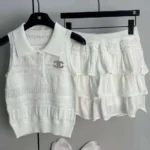 Chanel White Sleeveless Top & Ruffled Skirt Set – Elegant Designer Two-Piece Outfit in Dubai UAE