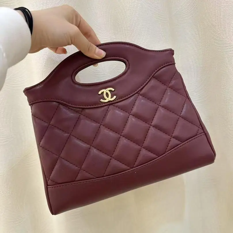 Chic Burgundy Quilted Chanel-Inspired Top-Handle Bag - Elegant & Compact in Dubai UAE Chic Burgundy Quilted Chanel-Inspired Top-Handle Bag - Elegant & Compact in Dubai UAE