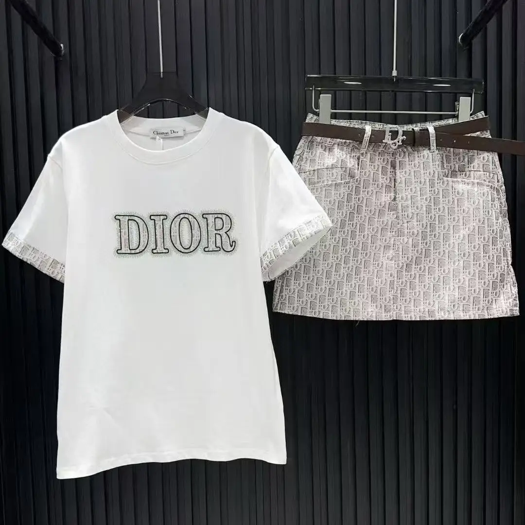 Dior Two-Piece Outfit – White Logo T-Shirt & Patterned Mini Skirt Set in Dubai UAE Dior Two-Piece Outfit – White Logo T-Shirt & Patterned Mini Skirt Set in Dubai UAE