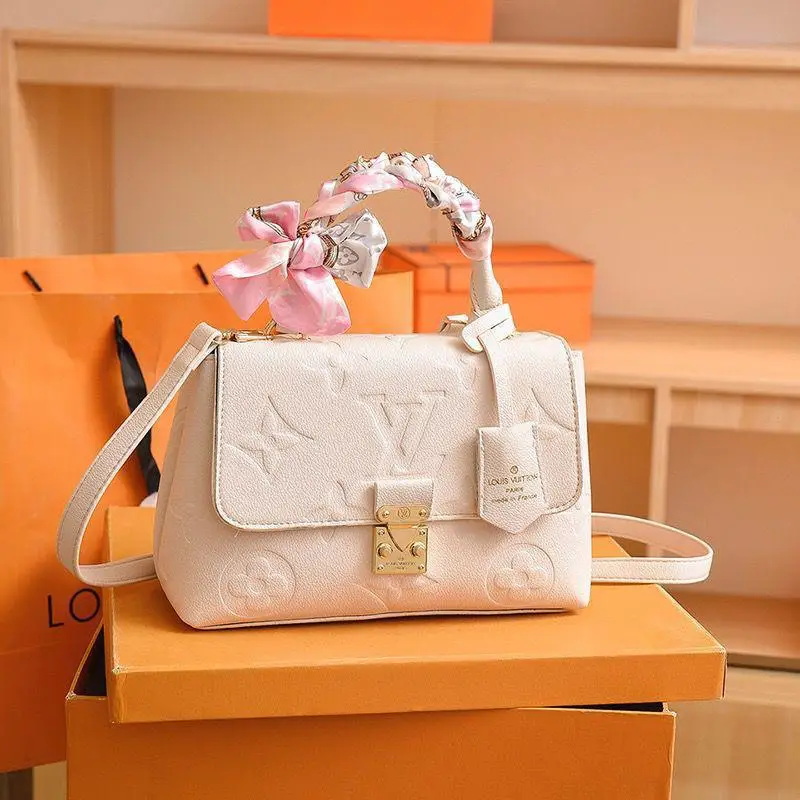 Louis Vuitton Madeleine BB Bag – Monogram Empreinte Leather in Dubai UAE Louis Vuitton Madeleine BB Bag – Monogram Empreinte Leather in Dubai UAE