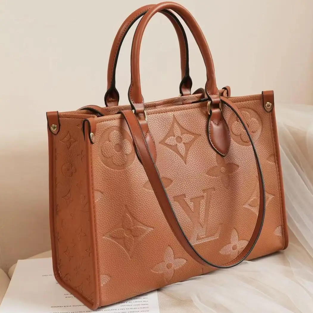 Louis Vuitton OnTheGo PM Tote Bag in Monogram Empreinte Leather – Compact Luxury in Dubai UAE Louis Vuitton OnTheGo PM Tote Bag in Monogram Empreinte Leather – Compact Luxury in Dubai UAE