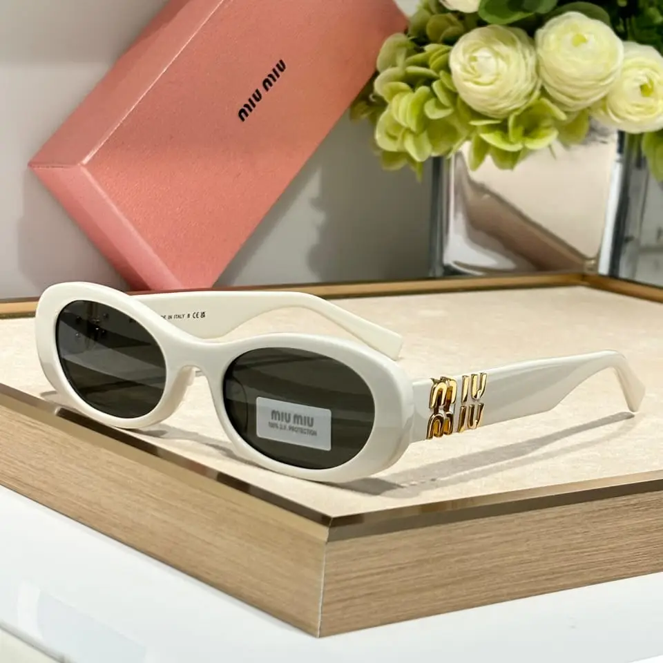 Miu Miu MU 06ZS Sunglasses – White Oval Frame with Logo-Embellished Metal Hinges in Dubai UAE Miu Miu MU 06ZS Sunglasses – White Oval Frame with Logo-Embellished Metal Hinges in Dubai UAE