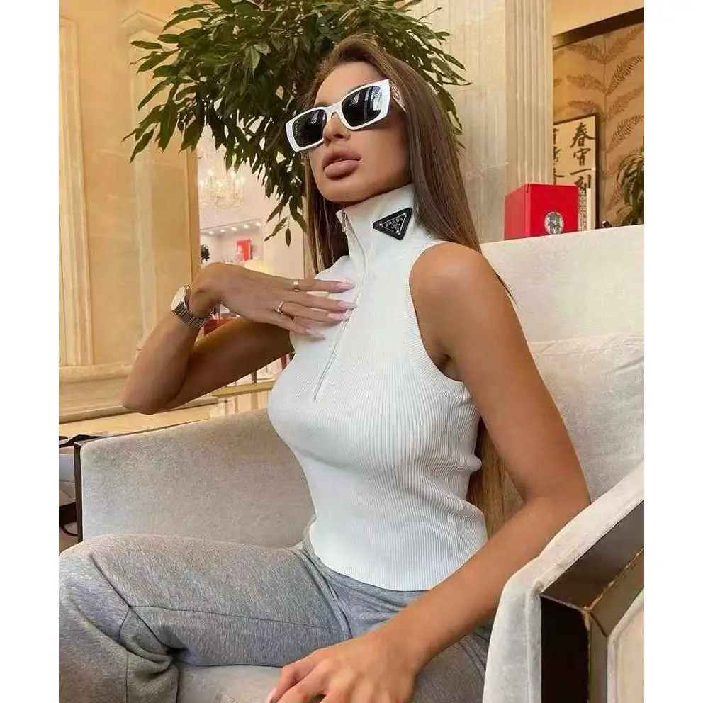 Prada Ribbed Knit Jersey Tank Top – White Sleeveless High-Neck Top with Triangle Logo in Dubai UAE Prada Ribbed Knit Jersey Tank Top – White Sleeveless High-Neck Top with Triangle Logo in Dubai UAE