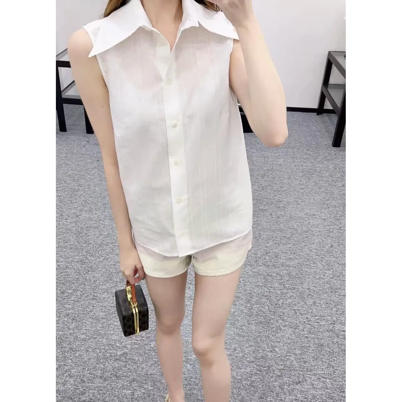 Sleeveless Collared Shirt and Shorts Set – Stylish Two-Piece Summer Outfit for Women in Dubai UAE Sleeveless Collared Shirt and Shorts Set – Stylish Two-Piece Summer Outfit for Women in Dubai UAE